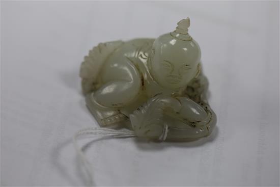 A Chinese white jade figure of a boy, 19th century, 5.5cm